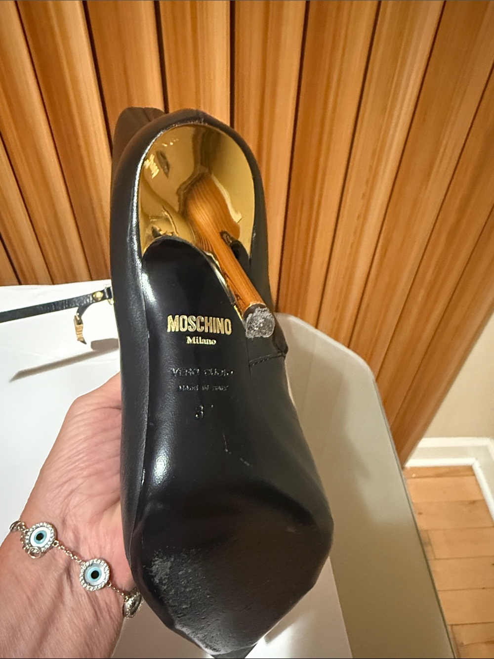 Moschino Black Leather Pointed Toe Mid-Calf Boots with Gold Accents - Picture 5 of 12